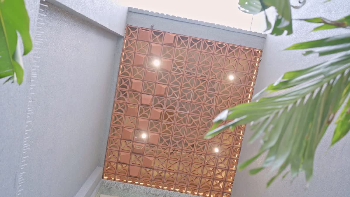 Copper jali detail at Eden Aura