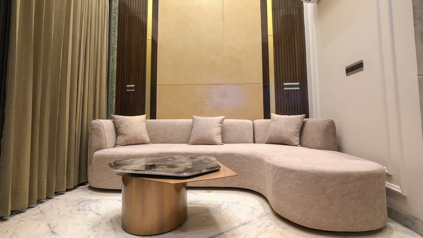 The double-height living room inside an Eden Aura villa